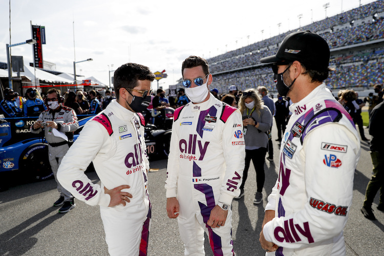 Mike Rockenfeller mit Simon Pagenaud (Mitte) und Johnson (re.)