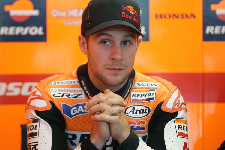 Jonathan Rea betet im Repsol-Dress für eine gelungene Premiere