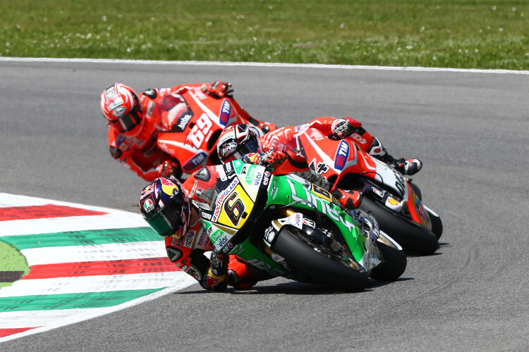 Dovizioso (4) im Kampf gegen Bradl (6) und Hayden (69)