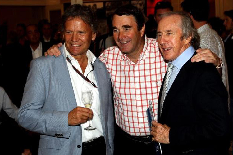 Marc Surer mit den Weltmeistern Nigel Mansell und Sir Jackie Stewart