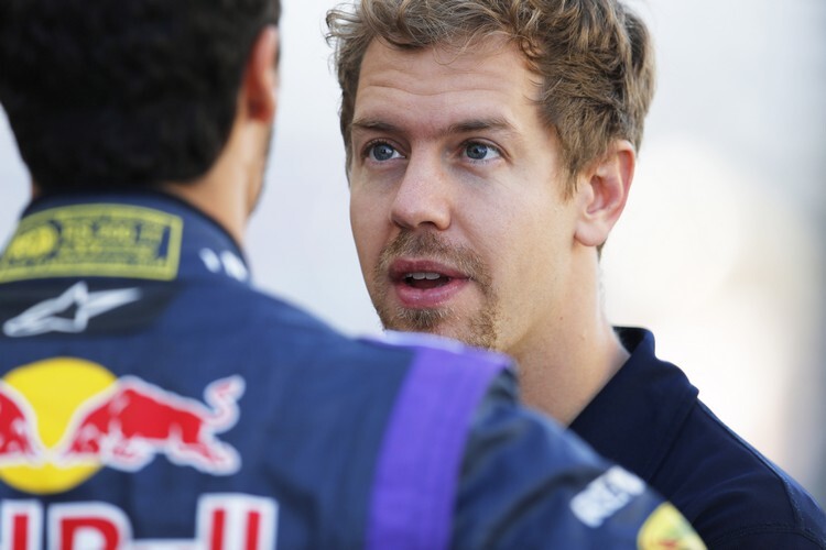Daniel Ricciardo im Gespräch mit Sebastian Vettel