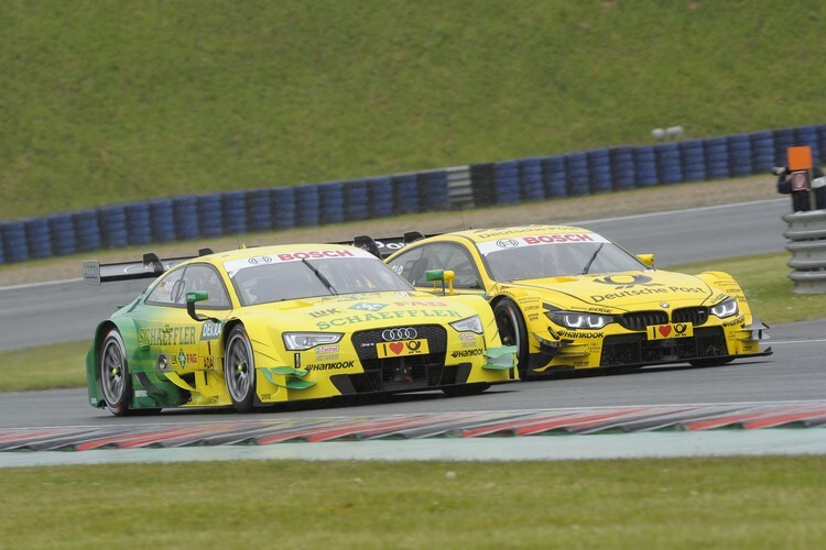 Timo Glock im Duell mit Mike Rockenfeller