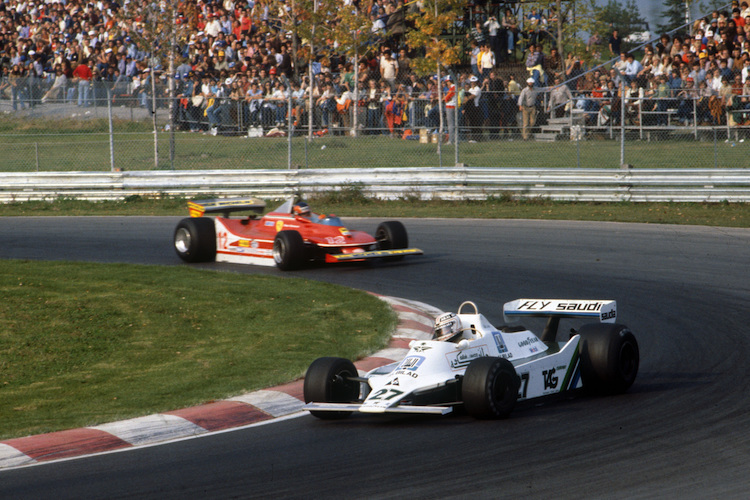 Alan Jones 1979 vor Ferrari-Star Gilles Villeneuve