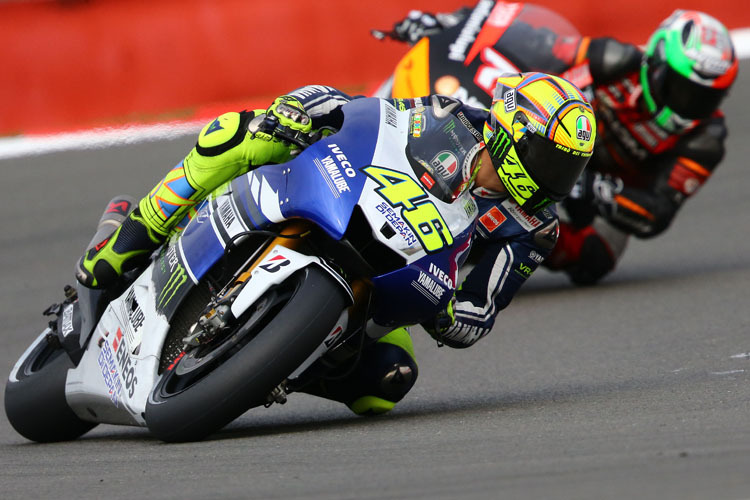 Valentino Rossi vor Claudio Corti