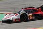 Der Racing for Charity-Sticker auf dem Kotflügel des Porsche 963