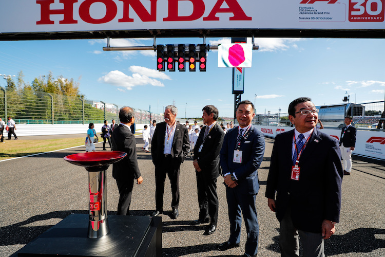 Honda-Chef Takahiro Hachigo (ganz rechts) vor dem Grossen Preis von Japan 2018