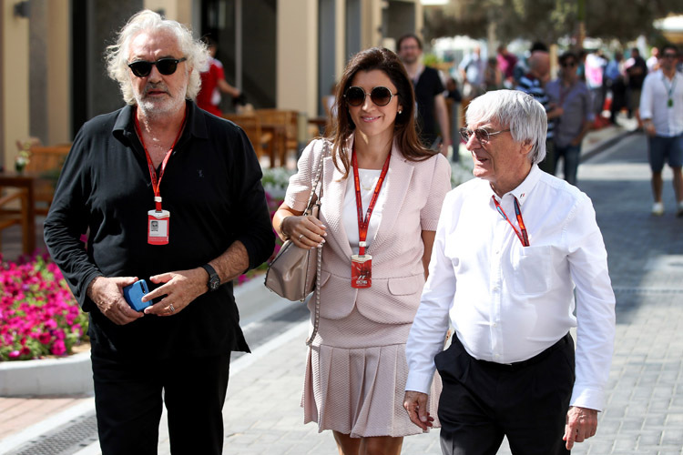 Flavio Briatore (im Bild mit Fabiana und Bernie Ecclestone) ist nur noch selten im Formel-1-Fahrerlager zu Gast