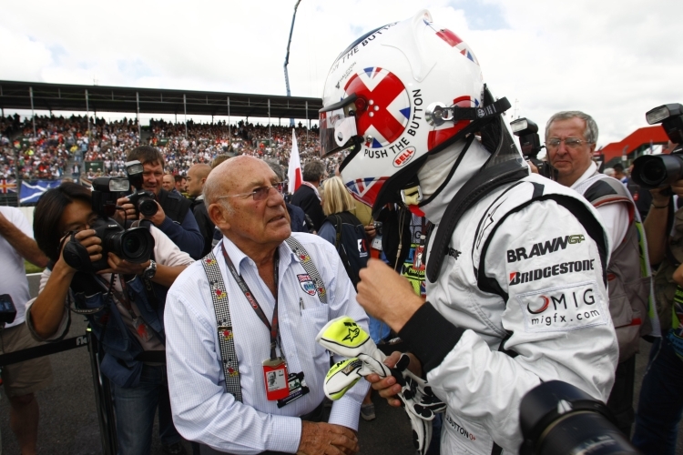 Sir Stirling Moss grauliert Jenson Button