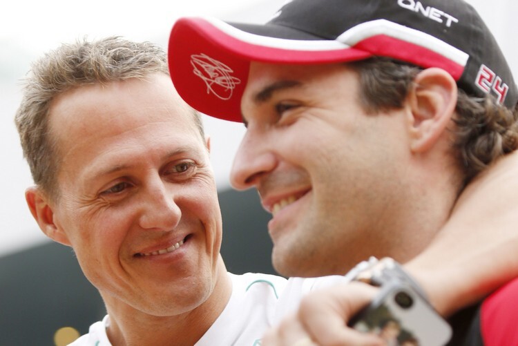 Timo Glock 2012 mit Michael Schumacher in Indien