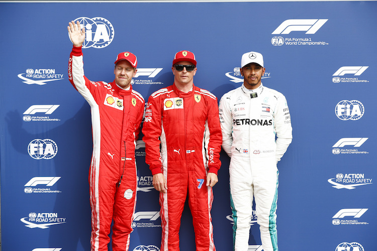Sebastian Vettel, Kimi Räikkönen und Lewis Hamilton
