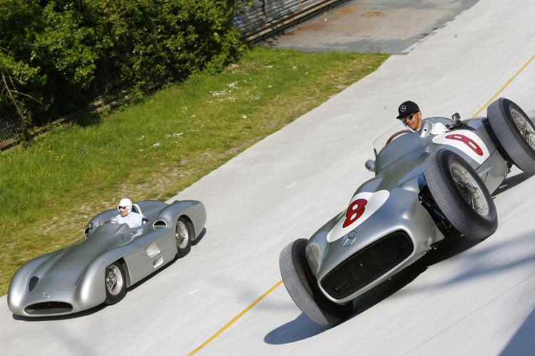 Sir Stirling Moss neben Lewis Hamilton in Monza