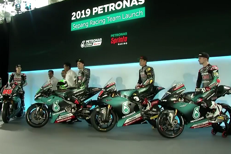 John McPhee (rechts) neben Khairul Idham Pawi, Franco Morbidelli und Fabio Quartararo