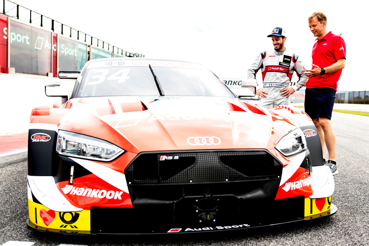 Andrea Dovizioso mit seinem Audi und Coach Mattias Ekström