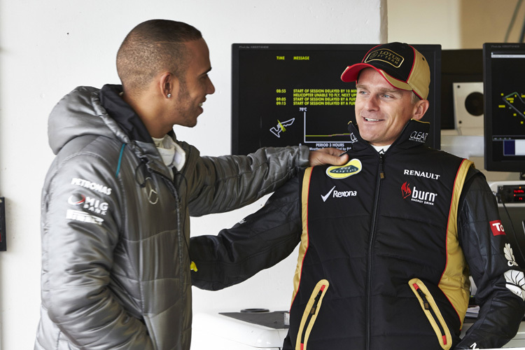 Lewis Hamilton gratuliert Heikki Kovalainen zu einer feinen Leistung