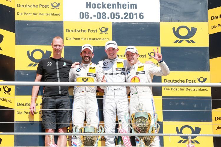 Timo Glock und Paul di Resta mit Augusto Farfus auf dem Podium