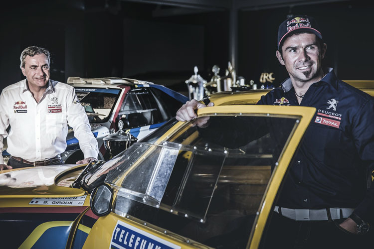 Die Dakar-Sieger Carlos Sainz und Cyril Despres (re.) treten 2015 für Peugeot an