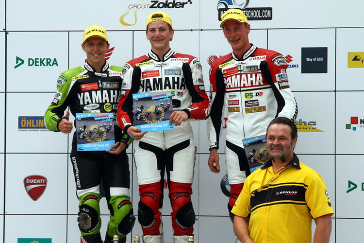 Fischer, Trautmann und Mertens mit Dunlop-Sportchef Christmann (v.l.)
