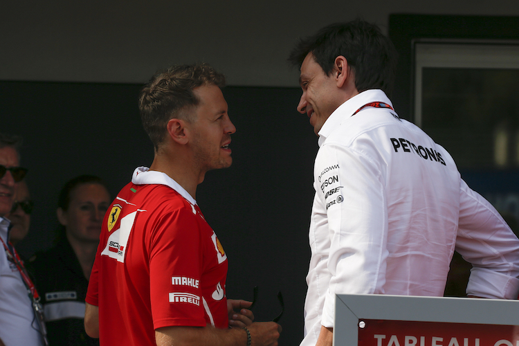 Sebastian Vettel und Toto Wolff