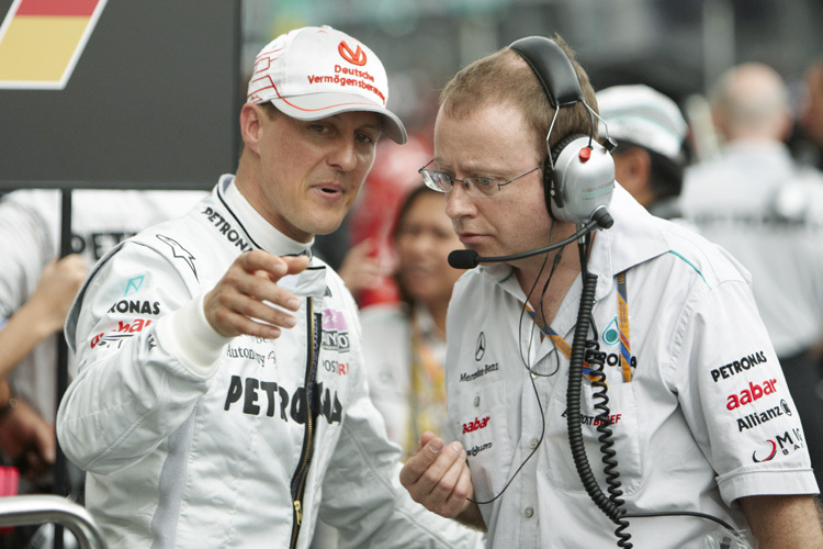 Schumi mit seinem Renningenieur Mark Slade.