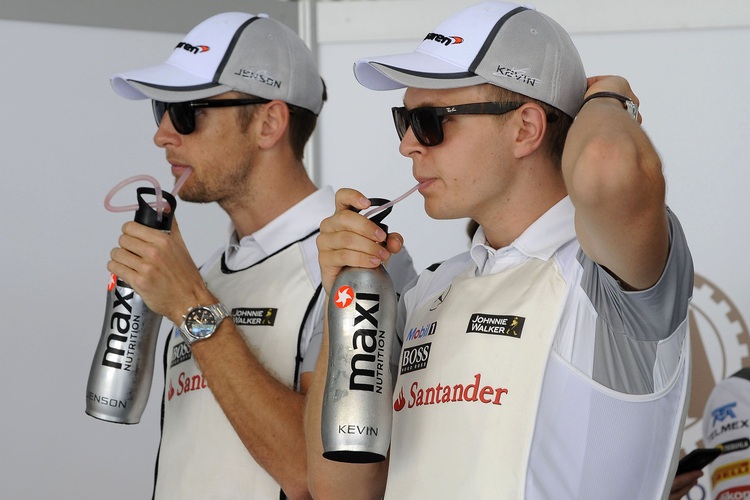 Jenson Button (l.), Kevin Magnussen: 2014 noch ohne Sieg