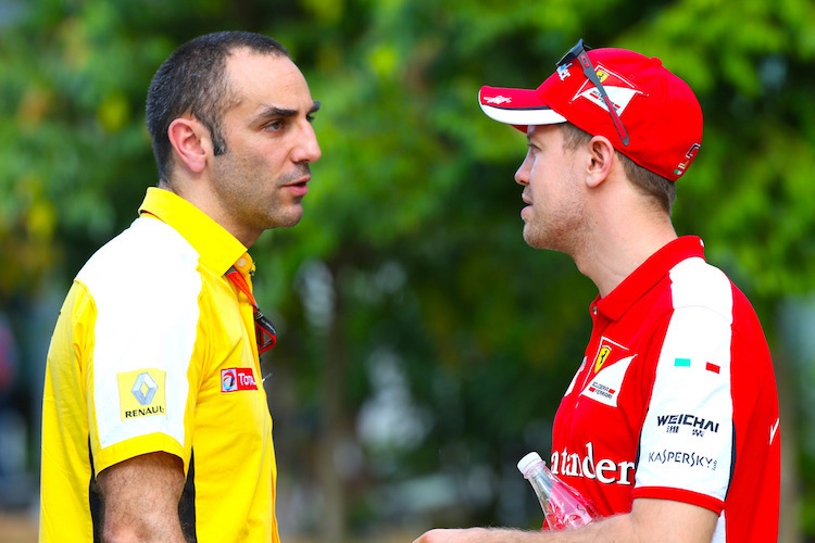 Renault-Teamchef Cyril Abiteboul und Sebastian Vettel