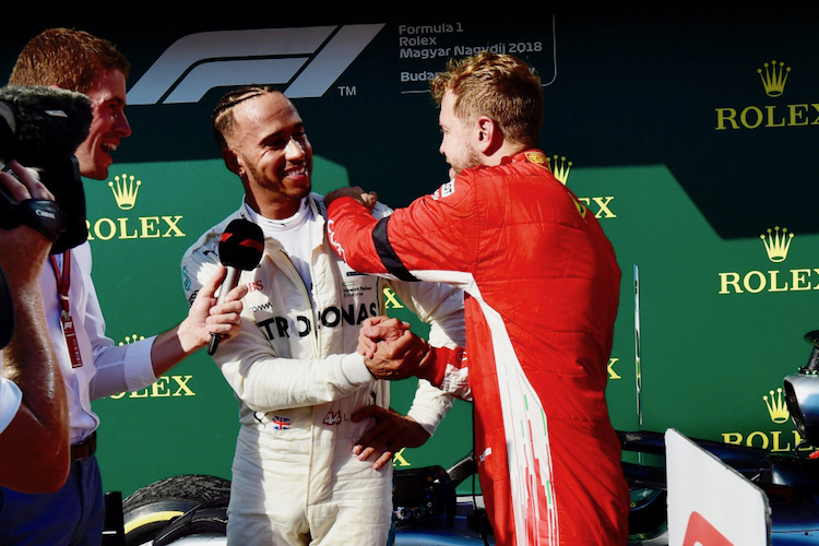 Lewis Hamilton mit Sebastian Vettel