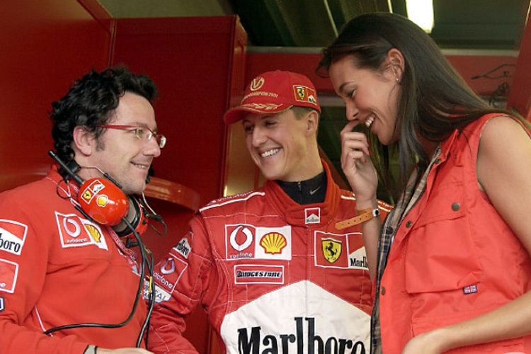 Luca Baldisserri mit Michael Schumacher und Model Megan Gale