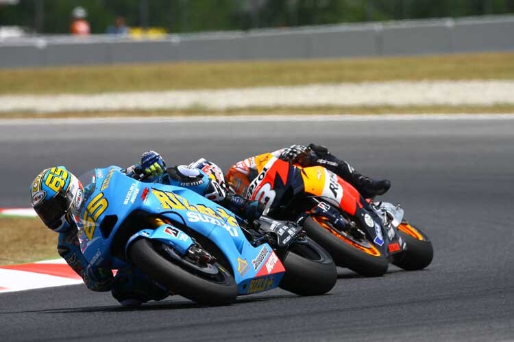 Loris Capirossi (Suzuki) vor Dani Pedrosa