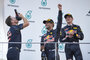 Christian Horner mit Daniel Ricciardo und Max Verstappen in Sepang