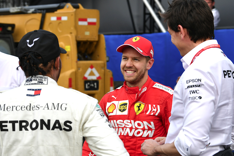 Lewis Hamilton, Sebastian Vettel und Toto Wolff