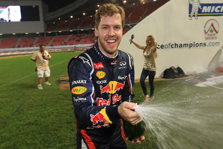 Vettel kennt sich mit Schampus schon aus