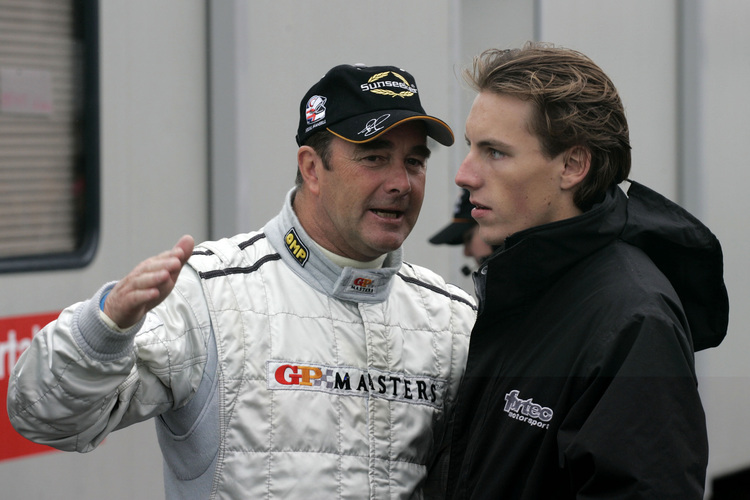 Buurman (re.) mit Nigel Mansell im Jahr 2006