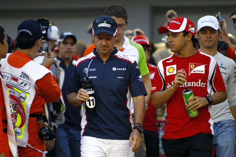 Ernste Mienen: Barrichello und Massa