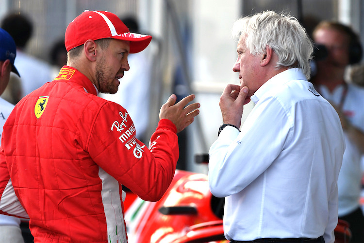 Sebastian Vettel und Charlie Whiting