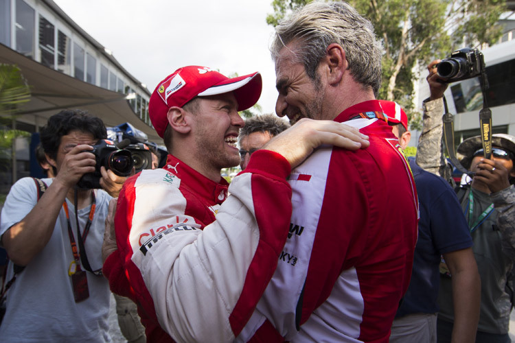 Sebastian Vettel und sein Teamchef Maurizio Arrivabene
