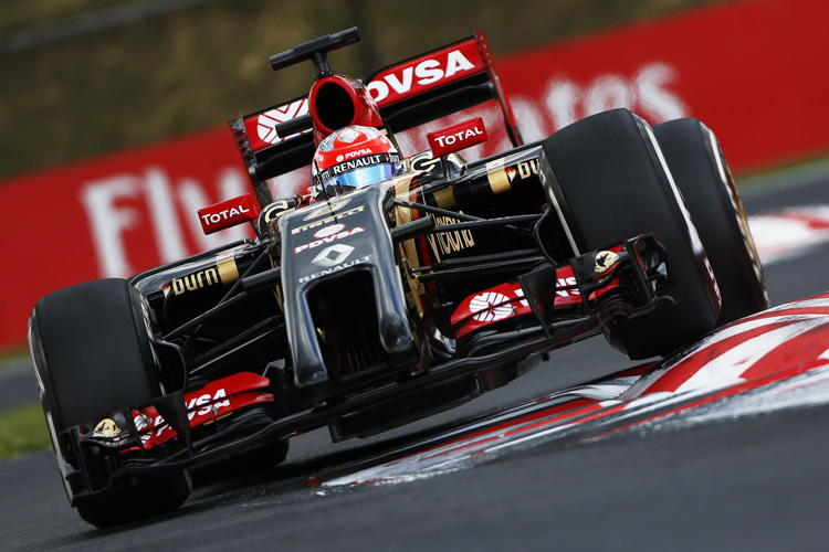 Romain Grosjean fährt sich mit dem Lotus E22 die Seele aus dem Leib