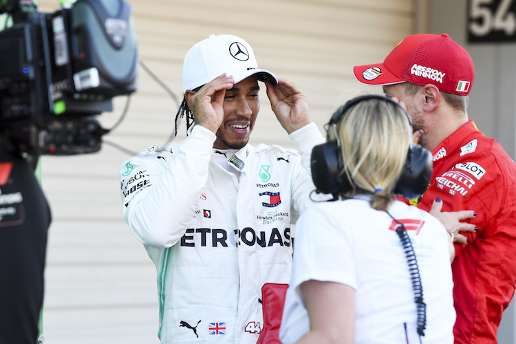 Lewis Hamilton mit Sebastian Vettel nach dem Grossen Preis von Japan