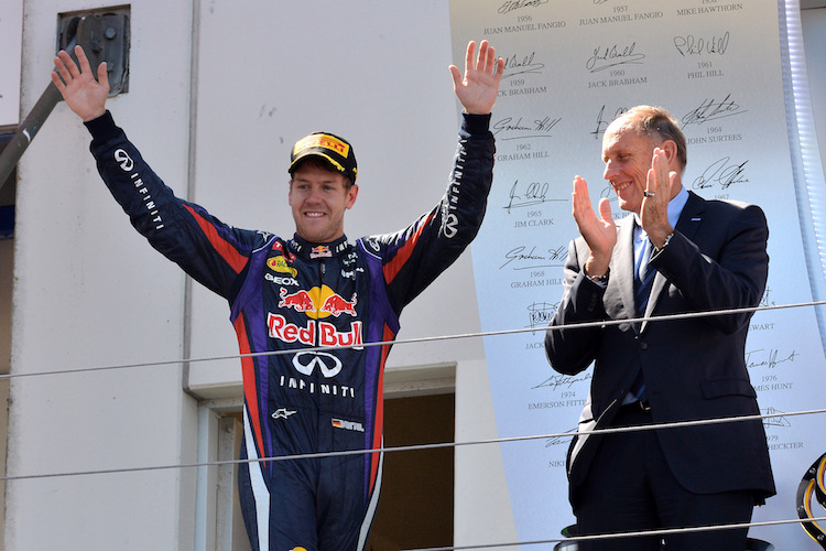 Sebastian Vettel und Hans-Joachim Stuck nach dem Grossen Preis von Deutschland 2013 auf dem Nürburgring