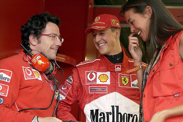 Luca Baldisserri mit Michael Schumacher und Megan Gale