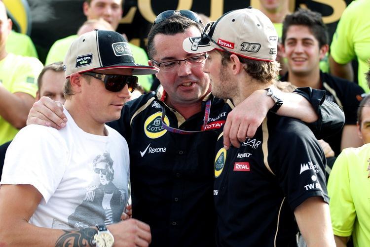 Lotus-Teamchef Eric Boullier mit Kimi Räikkönen und Romain Grosjean