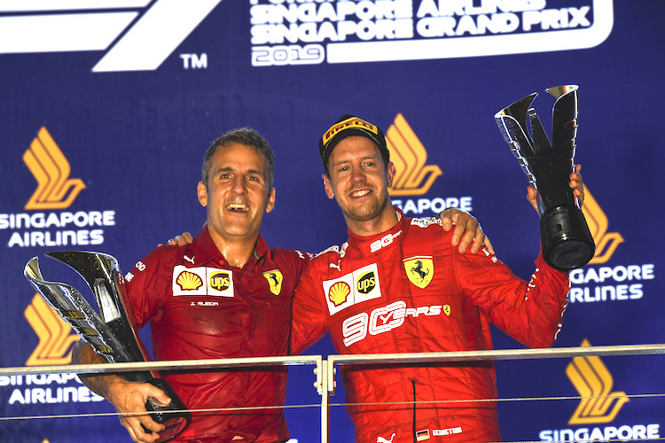 Iñaki Rueda und Sebastian Vettel 2019 in Singapur