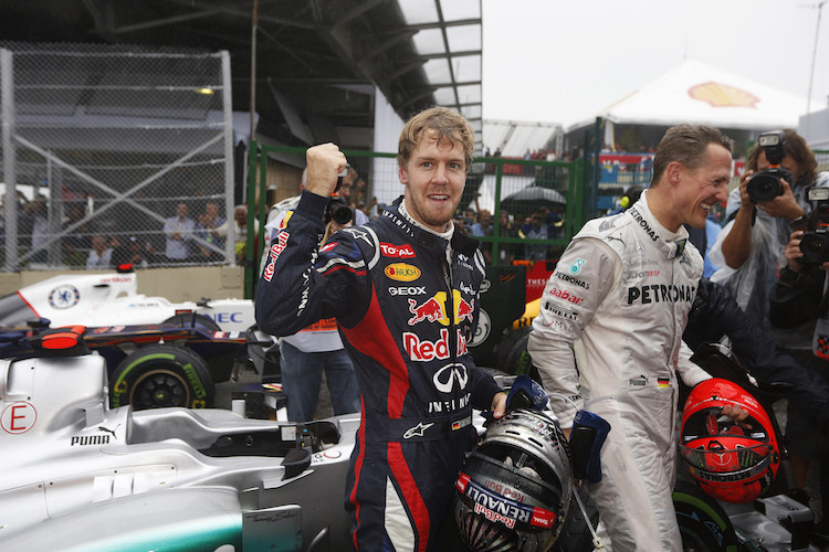 Sebastian Vettel nach dem Finale 2012 mit Michael Schumacher
