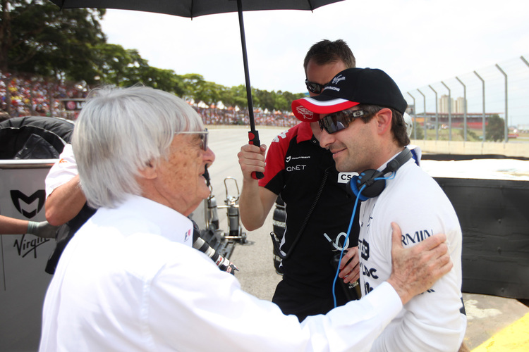 Timo Glock mit F1-Vermarktungschef Ecclestone