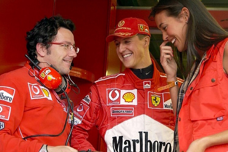 Luca Baldisserri mit Michael Schumacher und dem australischen Model Megan Gale