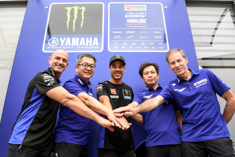 Franco Morbidelli (center) is welcomed by the top Yamaha
