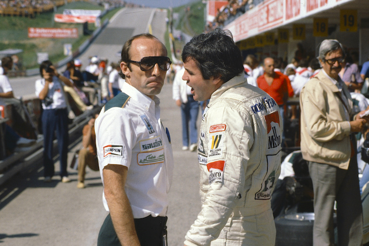 Frank Williams 1980 am Österreichring, rechts sein Lieblingsfahrer Alan Jones