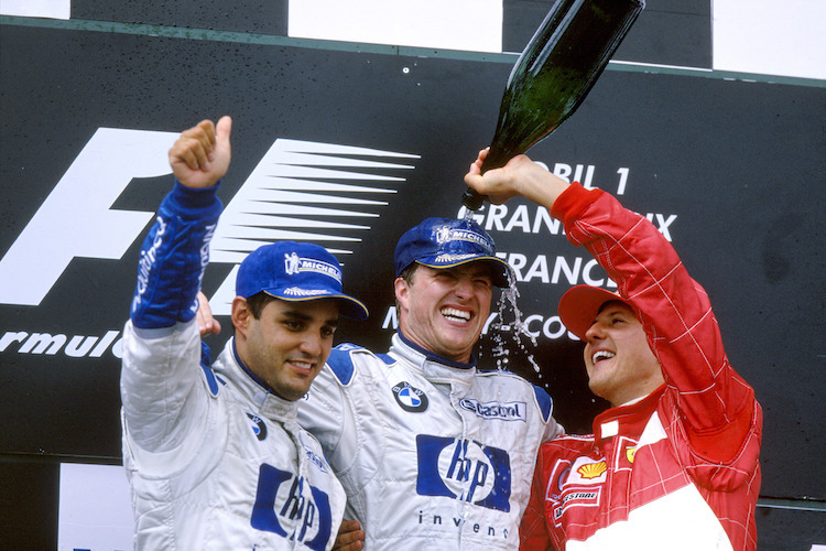 Juan Pablo Montoya mit Ralf und Michael Schumacher in Magny-Cours 2003