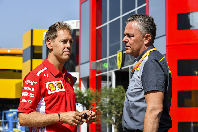 Sebastian Vettel und Mario Isola