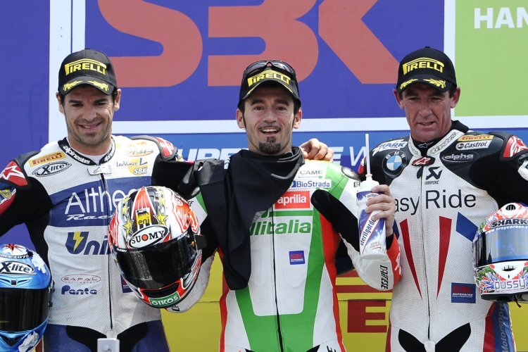 Carlos Checa, Max Biaggi und Troy Corser standen in Misano 2010 gemeinsam auf dem Podium