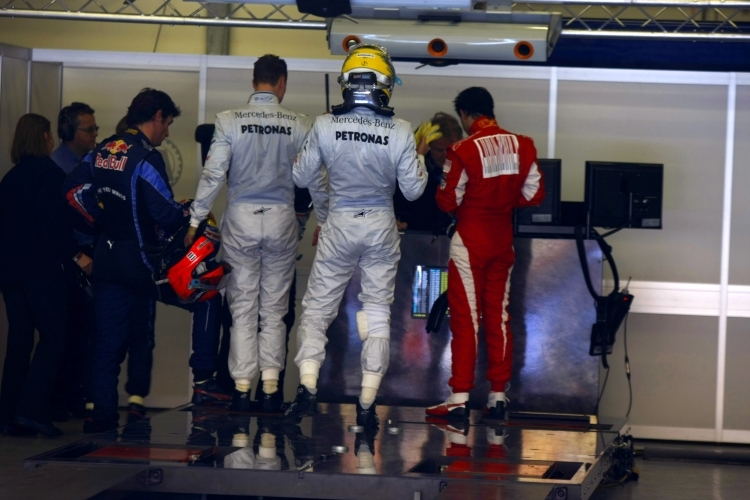 Michael Schumacher, Nico Rosberg und Felipe Massa (v. l. n. r.)